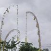 Balinese family builds a penjor